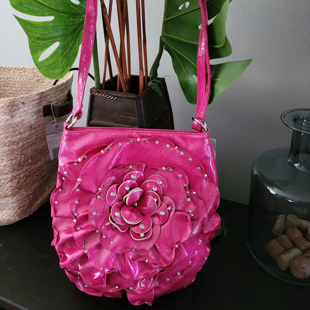 Hot pink crossbody purse.